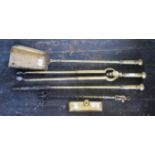 A GOOD SET OF 19TH CENTURY BRASS MOUNTED STEEL FIRE IRONS, comprising pierced shovel,