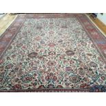 A TABRIZ STYLE PERSIAN CARPET, with double centre hexagonal medallion, on all over patterned field,