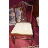 A SET OF THREE GEORGIAN MAHOGANY DINING CHAIRS, each with an arched back and pierced splat,