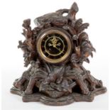 A VERY UNUSUAL AND RARE CARVED 'BLACK FOREST' MANTEL OR BRACKET CLOCK, 19th century by A.C.V.