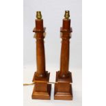 A PAIR OF MODERN MAHOGANY COLUMN TABLE LAMPS, 24" (61cm) approx.