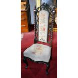 A VICTORIAN ROSEWOOD PRIE DIEU, the high back with a tapestry panel,