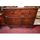 A GEORGE IV PERIOD MAHOGANY SECRETAIRE