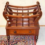A VICTORIAN MAHOGANY MUSIC CANTERBURY, with scroll sides and railed four division music sections,