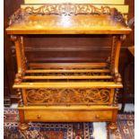 A LARGE VICTORIAN WALNUT CANTERBURY WHATNOT, with pierced three quarter gallery,