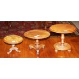 A CIRCULAR VICTORIAN WALNUT MINIATURE FLIP-TOP BREAKFAST TABLE, on tri-pod base, 7.