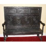 A CARVED OAK HIGH BACK BENCH, 18th century and later,