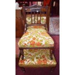 AN EDWARDIAN WALNUT NURSING OR LADIES CHAIR,