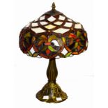A TIFFANY STYLE BRONZED TABLE LAMP, with coloured and metal glazed shade, 17" (43cm)h.
