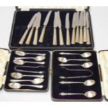 A CASED SET OF TWELVE ART DECO SILVER HANDLED FRUIT KNIVES,