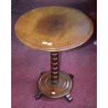 A LATE 19TH CENTURY CIRCULAR MAHOGANY OCCASIONAL TABLE, with bead turned stem,