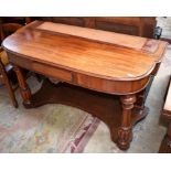 A VICTORIAN MAHOGANY DUCHESS DRESSING TABLE BASE, lacking top, the bow front with a frieze drawer,