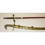 AN OLD NAVAL OFFICER'S SABRE, the brass hilt with a stylised lion head,
