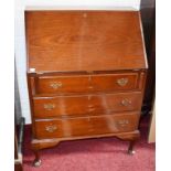 A MAHOGANY BUREAU, O.R.M.