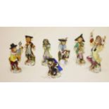 A SEVEN PIECE GERMAN PORCELAIN MONKEY BAND, with conductor and musicians, the tallest 6" (15cm).