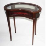 AN EDWARDIAN INLAID AND CROSSBANDED MAHOGANY KIDNEY SHAPED CURIO TABLE,