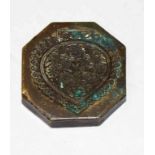 AN EARLY HEAVY INDO-PERSIAN BRONZE SEAL, of octagonal form, chased with scrolling foliage, 2.