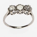 A VERY NICE THREE-STONE DIAMOND RING, with three round brilliant cut diamonds, in basket setting,