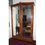 A BRASS MOUNTED SATINWOOD AND KINGWOOD BANDED FRENCH WARDROBE OR ARMOIRE,