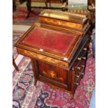 AN EDWARDIAN INLAID AND MARQUETRY ROSEWOOD DAVENPORT,