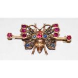 A 9K GOLD SEMI ANTIQUE BUTTERFLY BROOCH SET, with garnets, sapphires, diamonds, and pearls, 1.