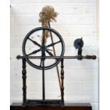 A 19TH CENTURY PINE AND ELM FOOT OPERATED SPINNING WHEEL,