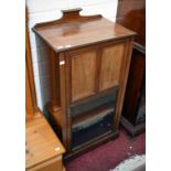 AN EDWARDIAN INLAID AND SATINWOOD BANDED MUSIC CABINET,