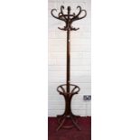 A BENTWOOD HAT, STICK AND COAT STAND, on four sabre legs.