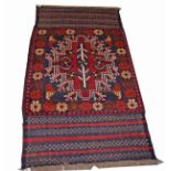 A SMALL AFGHAN TRIBAL RUG, 5ft1 (155cm)l x 2ft8" (82cm).