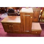 A MODERN MAHOGANY VENEERED TWO-TIER OFFICE OR TV STAND, with three cupboard doors and a drawer,