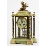 A FRENCH GREEN ONYX FOUR GLASS MANTLE CLOCK, with ornate brass mounts,