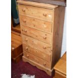 A SIX DRAWER PINE CHEST, 23" (59cms).