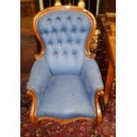 TWO SIMILAR VICTORIAN MAHOGANY BUTTON-BACK ARM CHAIRS, each with balloon shaped padded back,