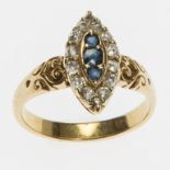 A MARQUISE SHAPED 18K GOLD RING, set with three central round sapphires,