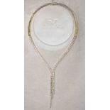 A VERY FINE 18K WHITE GOLD LADIES DIAMOND WATERFALL NECKLACE, total weight 33.