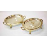 A PAIR OF OLD SHEFFIELD SILVER PLATED OVAL WARMING STANDS,