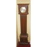 A SMALL INLAID OAK CHIMING GRANDMOTHER CLOCK, with circular dial, and Arabic numerals,