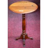 AN OVAL MAHOGANY OCCASIONAL TABLE, on turned pine stem, with quadruple pod, adapted, 31" (78cm)d.