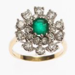 AN EMERALD AND DIAMOND CLUSTER RING, with twenty round brilliant cut diamonds,