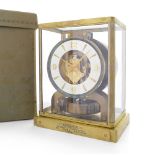 JAEGER LE COULTRE ATMOS ANNI '60. C. rectangular, gilt brass with crystals on all sides and