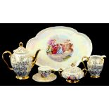 A CZECHOSLOVAKIAN LUSTRE DECORATED CABARET SERVICE IN VIENNA STYLE, TRAY 31CM W