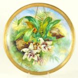 A STAFFORDSHIRE PORCELAIN PLAQUE PAINTED BY W. JONES, SIGNED WITH ORCHIDS IN ETCHED GILT RIM, 30CM