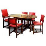 AN OAK GATELEG TABLE AND A SET OF FIVE OAK DINING CHAIRS, INCLUDING AN ELBOW CHAIR