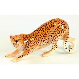 A BESWICK EARTHENWARE LEOPARD