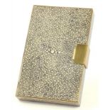 A GILTMETAL AND FAUX SHAGREEN MINAUDIERE WITH FITTED INTERIOR AND CRACKED MIRROR TO THE UNDERSIDE OF