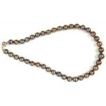 A BLACK CULTURED PEARL NECKLACE WITH 11.5-14MM CULTURED PEARLS AND WHITE GOLD CLASP, MARKED ON