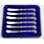 A SET OF SIX VICTORIAN SILVER PISTOL HAFTED TEA KNIVES, SHEFFIELD 1895, CASED