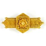 A VICTORIAN GOLD ETRUSCAN REVIVAL BROOCH, CIRCA 1880, 6.6G