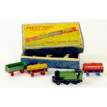 A DINKY TOYS MIXED GOODS TRAIN SET COMPRISING GREEN/BLACK ENGINE, GREEN/RED OPEN WAGON, RED/BLUE