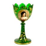 A BOHEMIAN GREEN GLASS OVERLAY VASE OF GOBLET SHAPE, PAINTED WITH A PORTRAIT OF A YOUNG LADY IN A